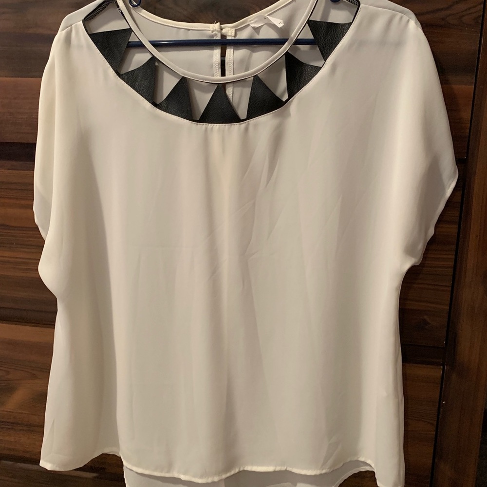 Sheer white T-shirt with leather detail